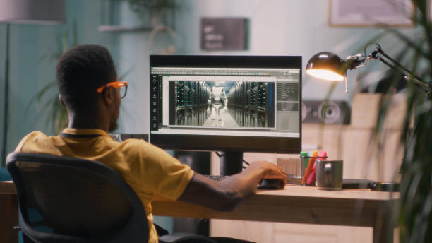 istock African American 3D designer creating robot model 1356607585