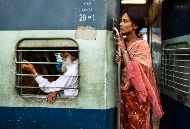 Passengers on train at Rishikesh railway station stock photo