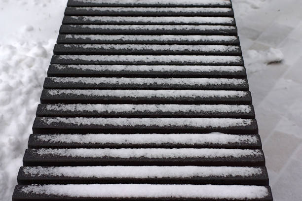 istock objects on the playground are covered with snow 1356607800
