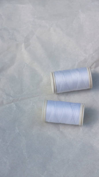 istock Reels of white thread 1356608553