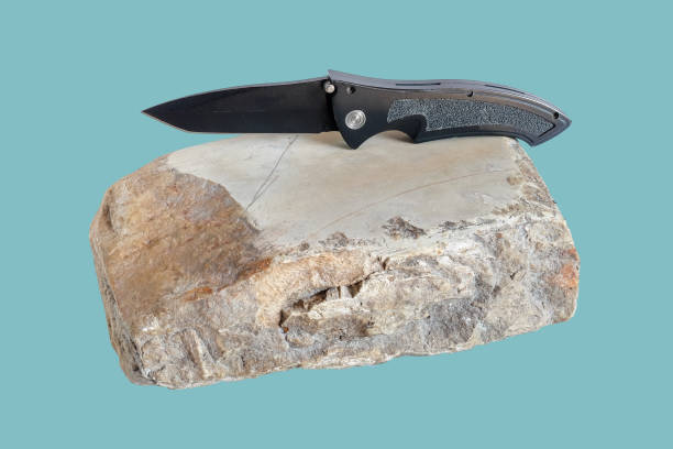 istock Nature whetstone knife or knife sharpening. Honing chef knife. 1356610135