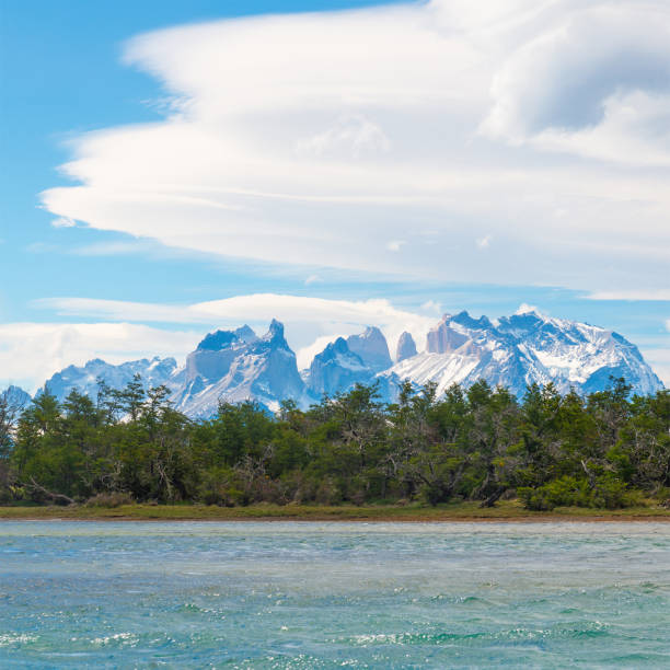 Andes mountain peaks of the Cuernos and Torres del Paine by the Serrano river, Torres del Paine national park, Patagonia, Chile.