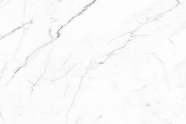 istock White marble texture background pattern top view. Tiles natural stone floor with high resolution. Luxury abstract patterns. Marbling design for banner, wallpaper, packaging design template 1356618521