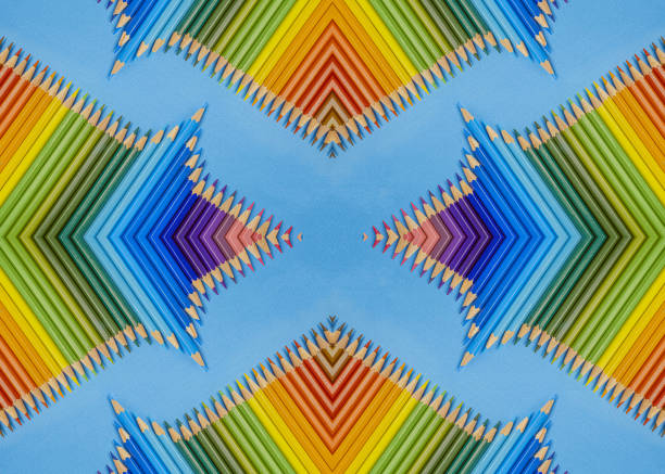 Various sharpened pencils are making their heads against each other and making a circle like a rainbow.