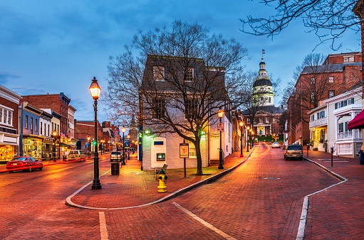 Annapolis, Maryland, USA downtown cityscape on Main Street at twilight.