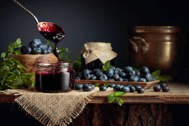 istock Blueberry jam with fresh berries. 1356621657