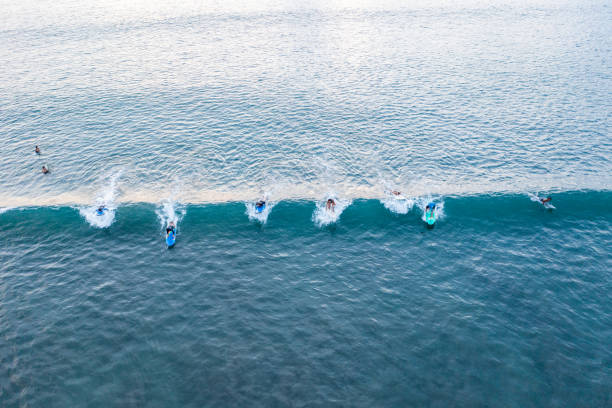 bali - surfers from above. - kuta bildbanksfoton och bilder