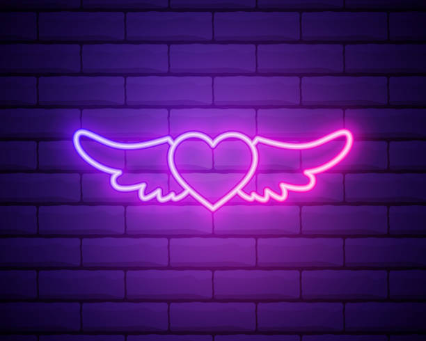 istock Heart with Wings purple glowing neon ui ux icon. Glowing sign logo vector isolated on brick wall background. 1356625313