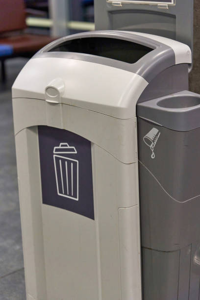istock A gray plastic waste basket in a public place 1356628721