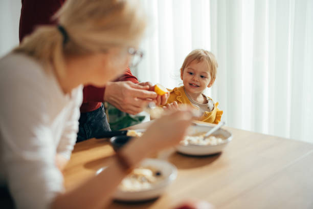 istock Family Time: Parents and Their Only Child Having Breakfast Together 1356633030