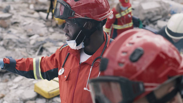 istock Black man speaking during rescue mission 1356634080