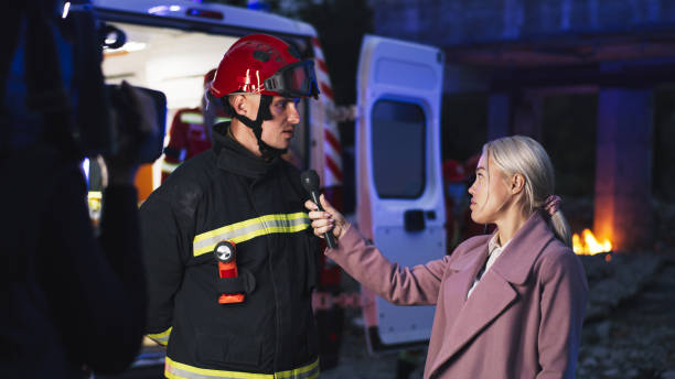 istock Interview near emergency van in evening 1356637542