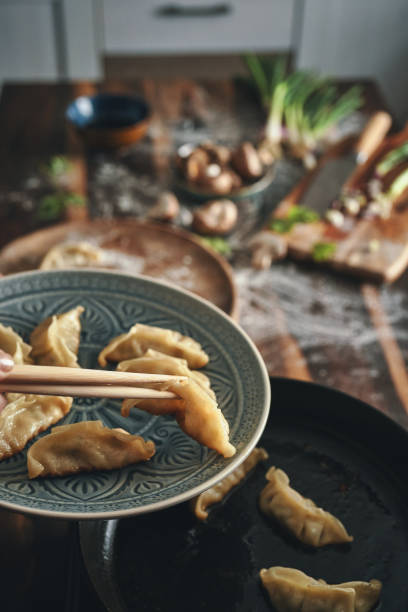istock Preparing Japanese Gyoza Dumplings 1356638804