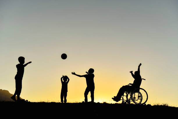 children with support for their friends with disabilities and a happy environment