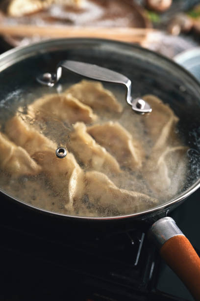 istock Preparing Japanese Gyoza Dumplings 1356638896