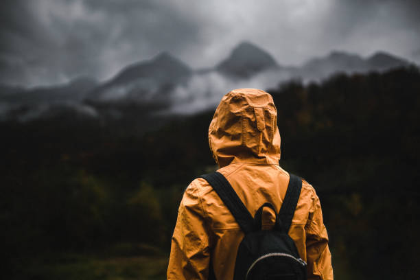istock Exploring mountains in bad rainy weather 1356642756