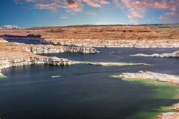 Scenic landscape view of clear blue water , sky,  rocky mountains in Utah or Arizona summer time. Beautiful tours destination