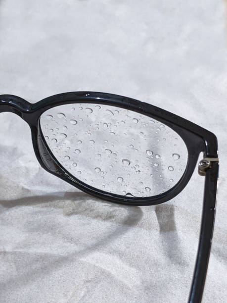 istock Close up raindrops on eyeglasses 1356644569