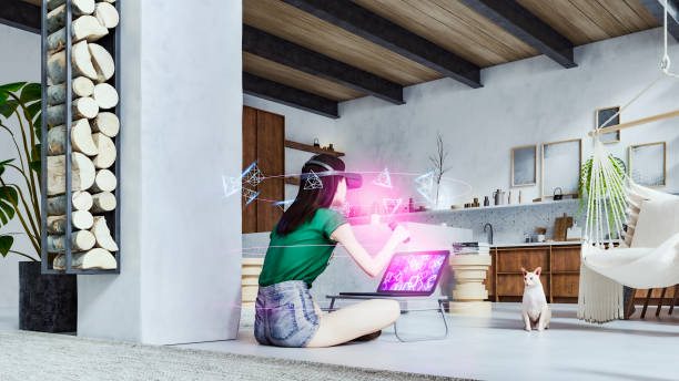 istock Young woman using VR headset at home 1356645480