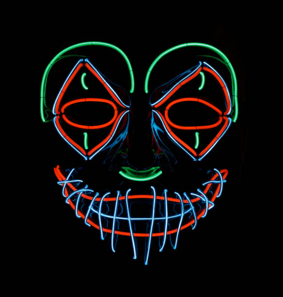 istock LED Scary Clown Mask Glowing in Red, Green, and Blue. 1356654600