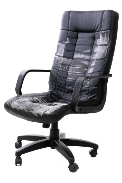 istock shabby leather office chair on isolated background 1356657359