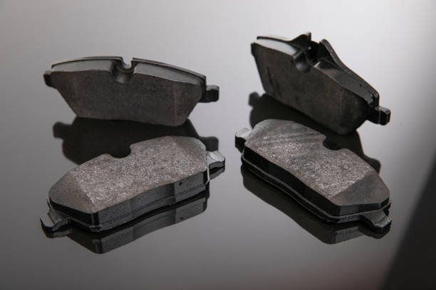 istock set of brake pads on a mirror background 1356661564