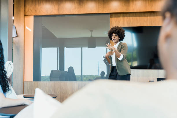 istock Businesswoman giving presentation 1356661671