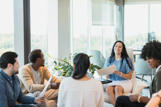 istock Group of business colleagues discuss projects 1356661688