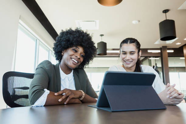 istock Businesswomen attending virtual meeting 1356661744