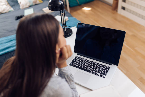 istock Young woman having an online conference from home office 1356668772