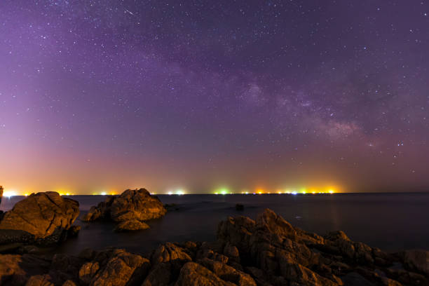 istock sea at night and beautiful Milky Way 1356669341