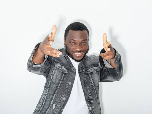 istock shooting gesture cool man successful achievement 1356677427