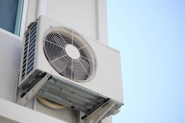 istock Air condition outdoor unit compressor install outside the house with blue sky 1356677488