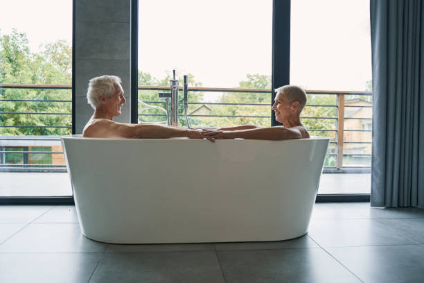 istock Two loving people having home spa together 1356679577