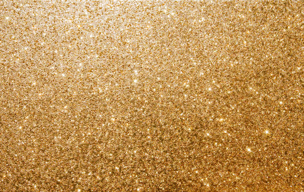 istock Shiny festive golden background. Gold abstract texture with glitter. 1356682042