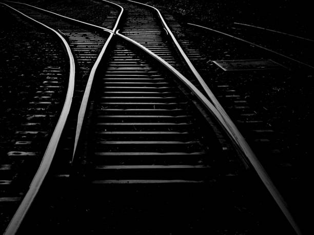 расставание - railroad track direction choice transportation стоковые фото и изображения