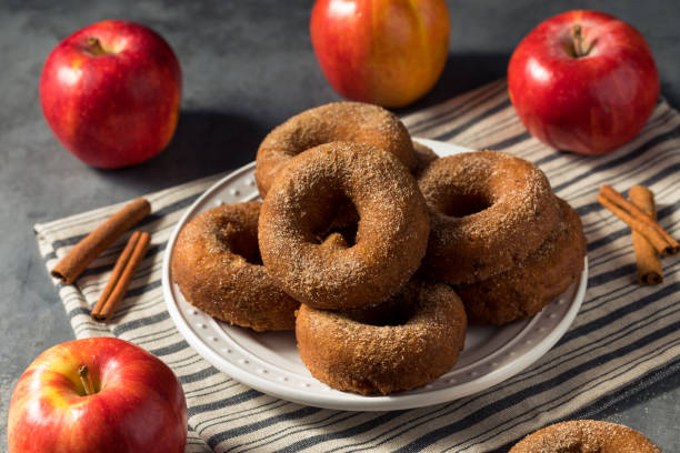 Sweet Homemade Apple Cider Donuts Sweet Homemade Apple Cider Donuts with Cinnamon Sugar apple juice photos stock pictures, royalty-free photos & images