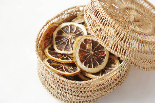close up of dry lemon in a bow on table .