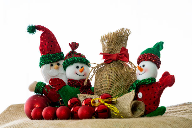 istock Santa Claus with the Christmas snowmen. 1356699613