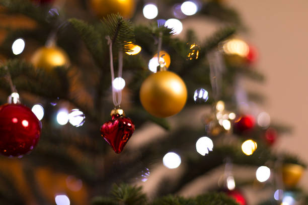 istock Christmas-tree decorations in home living room. 1356704344