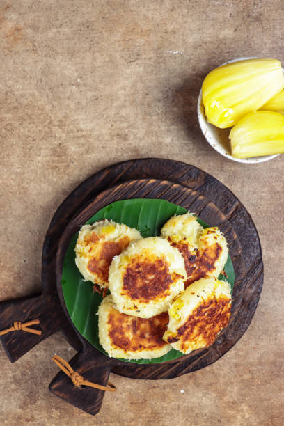 istock Wingko nangka or Jack fruit wingko is javanese traditional pancake made from grated coconut, gluotinous fluor and jack fruit. 1356704621