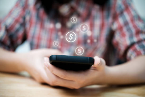 istock Young woman using a mobile phone 1356705354