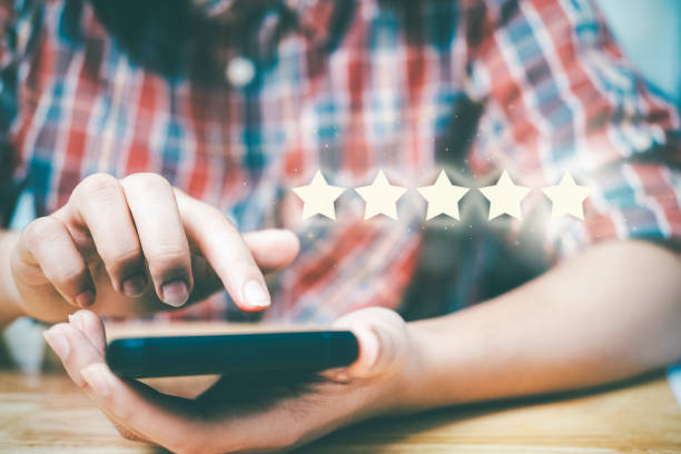 istock Young woman using a mobile phone 1356705358