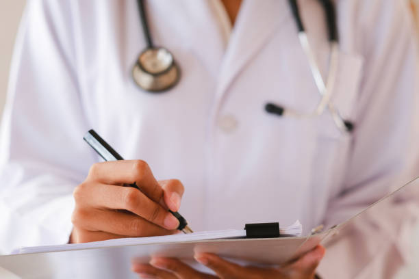 istock Doctors at hospital working in the doctor office. 1356706437