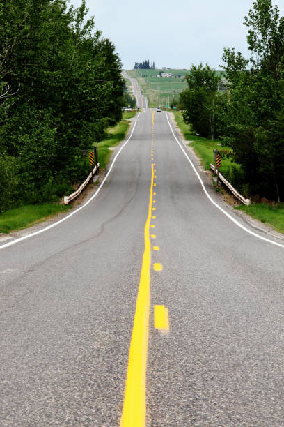 istock A highway with a yellow center line 1356707173