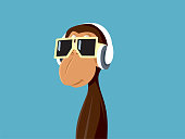 istock Cool Monkey Wearing Sunglasses Listening to Music Vector Cartoon 1356707314