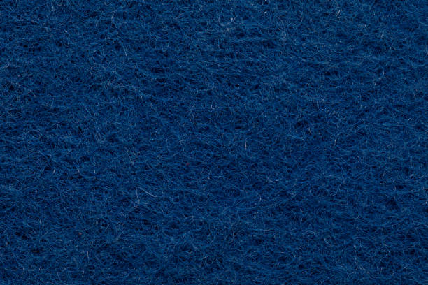 textura de tela de lana azul. útil como fondo para trabajos de diseño - felt tipped fotografías e imágenes de stock