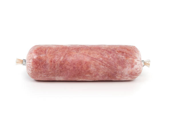 Human grade raw meat inclusive back, neck, liver and heart. Concept for barf, raw food diet for cats, dogs and pets. Isolated on white.