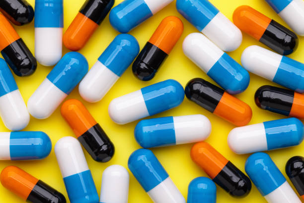 istock Medicines in capsules. Wallpaper, backgrounds and texture. 1356713604