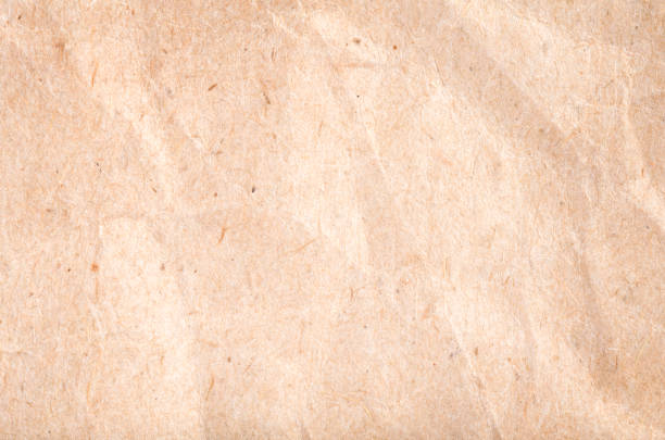 istock Texture of craft crumpled paper 1356717303